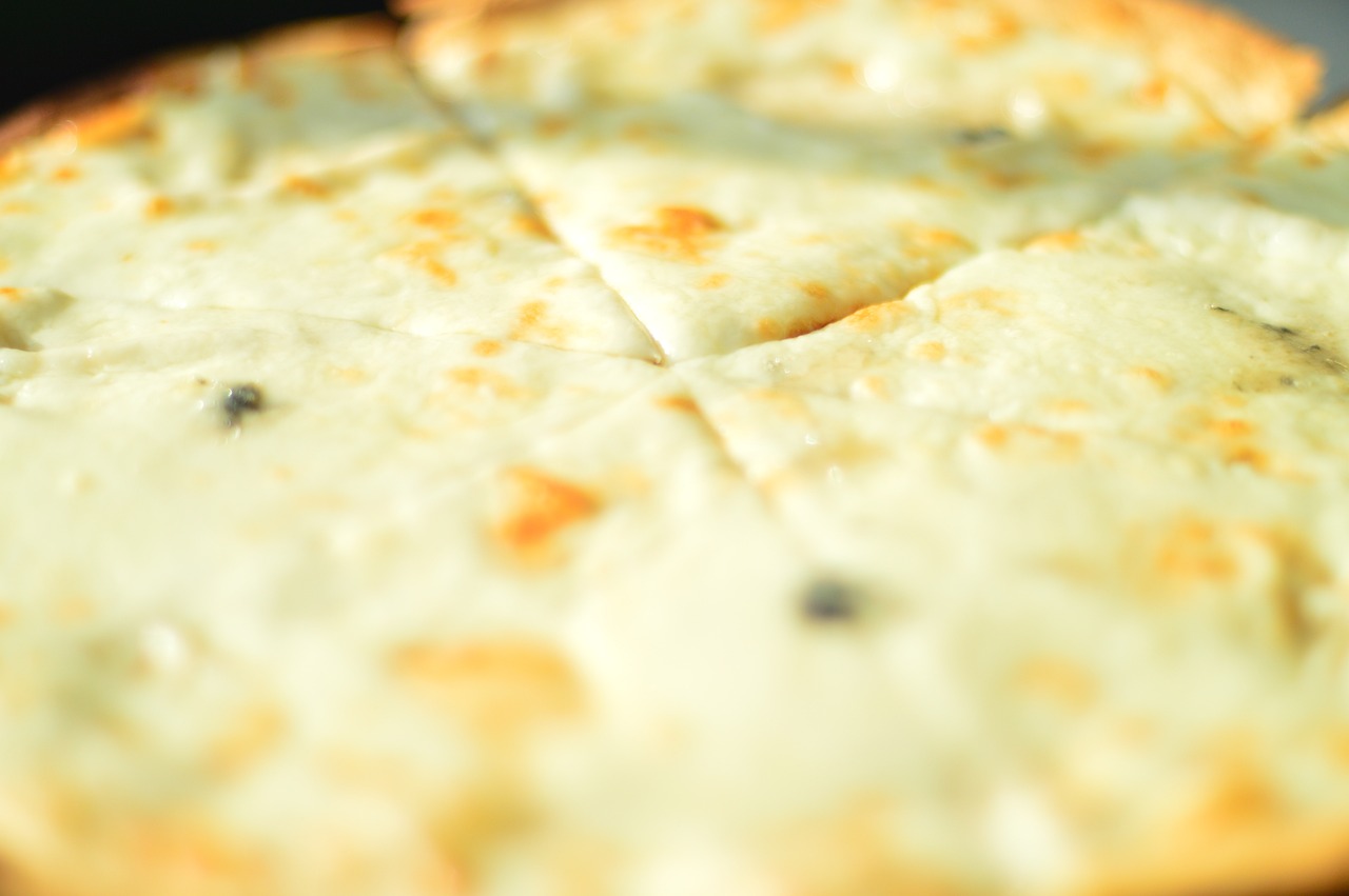 Pizza Gorgonzola Poires : L'Élégance du Fromage Bleu